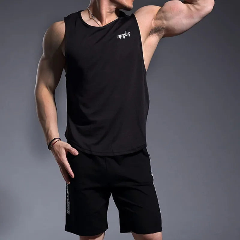 Men’s Gym Tank Top Quick-Dry Fitness Running Vest Bodybuilding Shirt worn by a muscular man flexing in black attire.