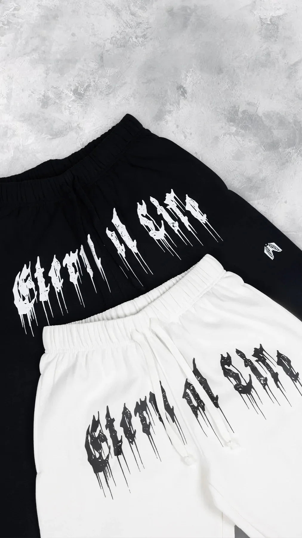 2024 Men’s Sports Pants Casual Gym Training Joggers for New Year in black and white with stylish designs.