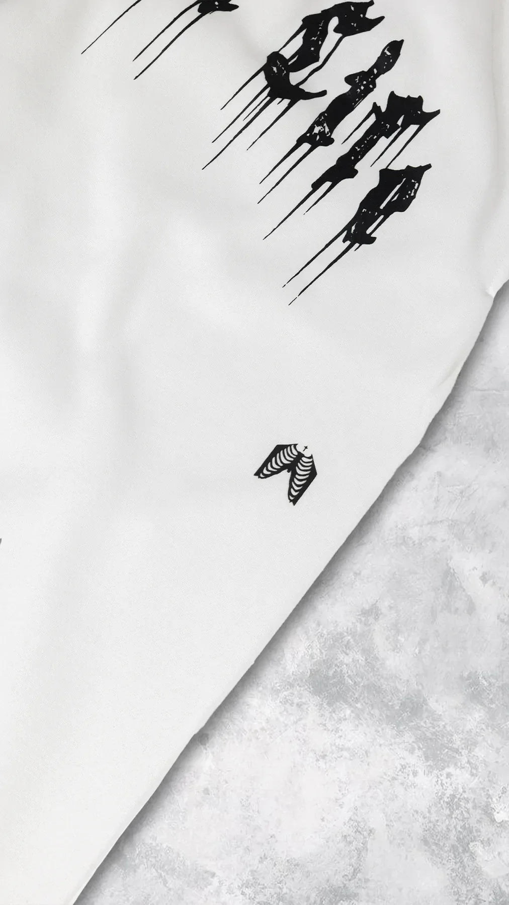 Close-up of the design on 2024 Men’s Sports Pants Casual Gym Training Joggers for New Year featuring black graphics.