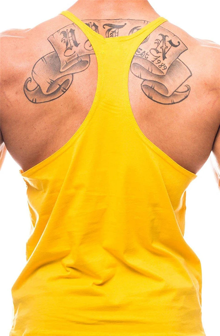 Men’s Gym Tank Top Cotton Y-Back Fitness Muscle Bodybuilding Vest in yellow, showcasing back design and tattoos.
