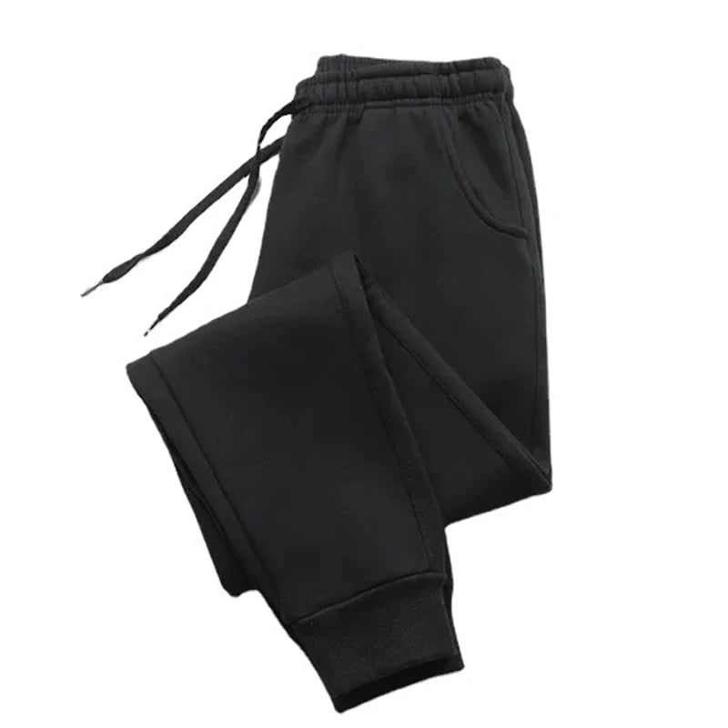 Men’s Casual Fashion Jogger Sweatpants Gym Running Workout Trousers in black color with elastic waistband and pockets.