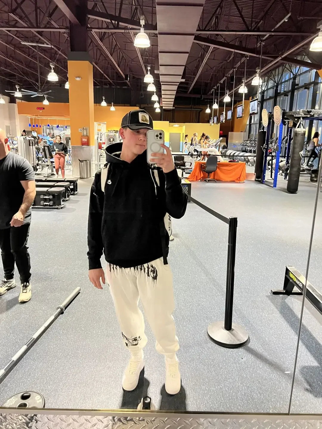 2024 Men’s Sports Pants Casual Gym Training Joggers for New Year worn in a gym setting, showcasing comfort and style.