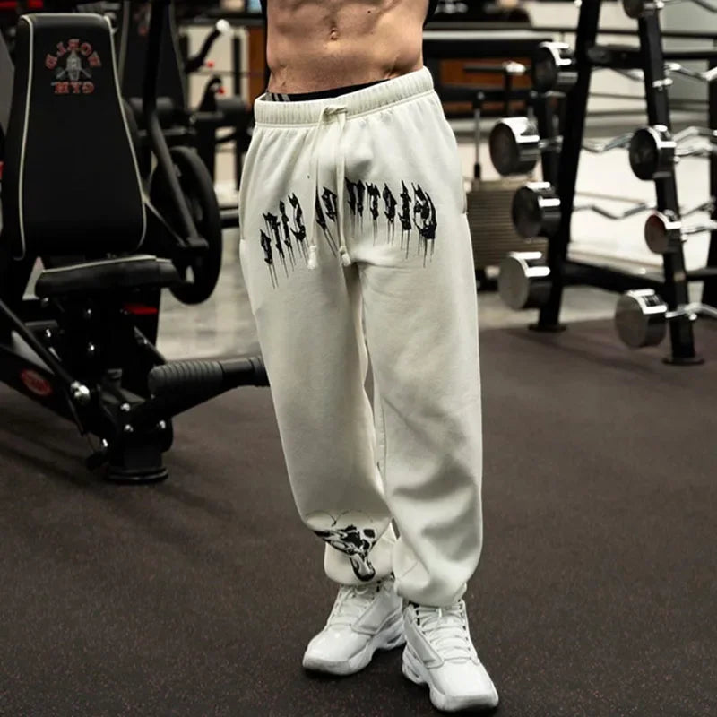 2024 Men’s Sports Pants Casual Gym Training Joggers for New Year, featuring stylish design and comfort in a gym setting.