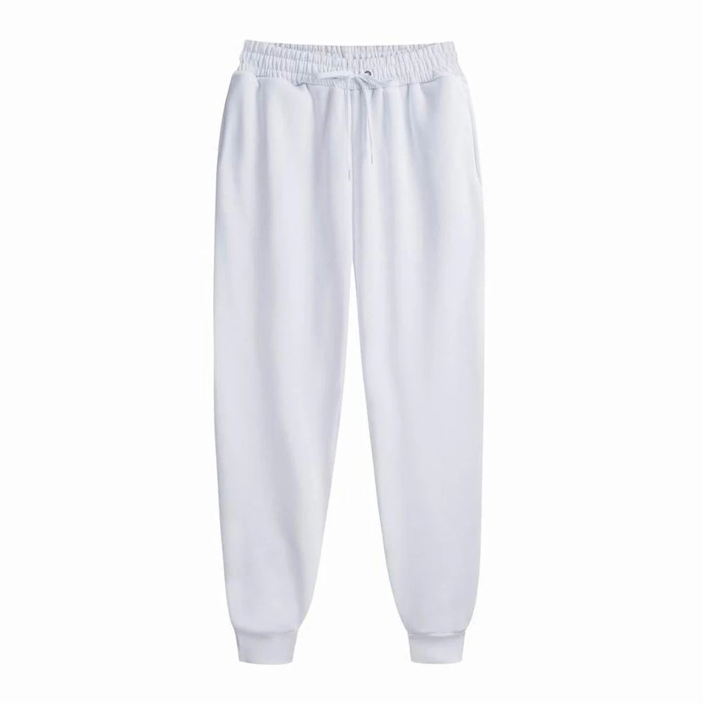 Men’s Casual Sports Jogger Sweatpants Gym Pants in white color with elastic waistband and adjustable drawstring.