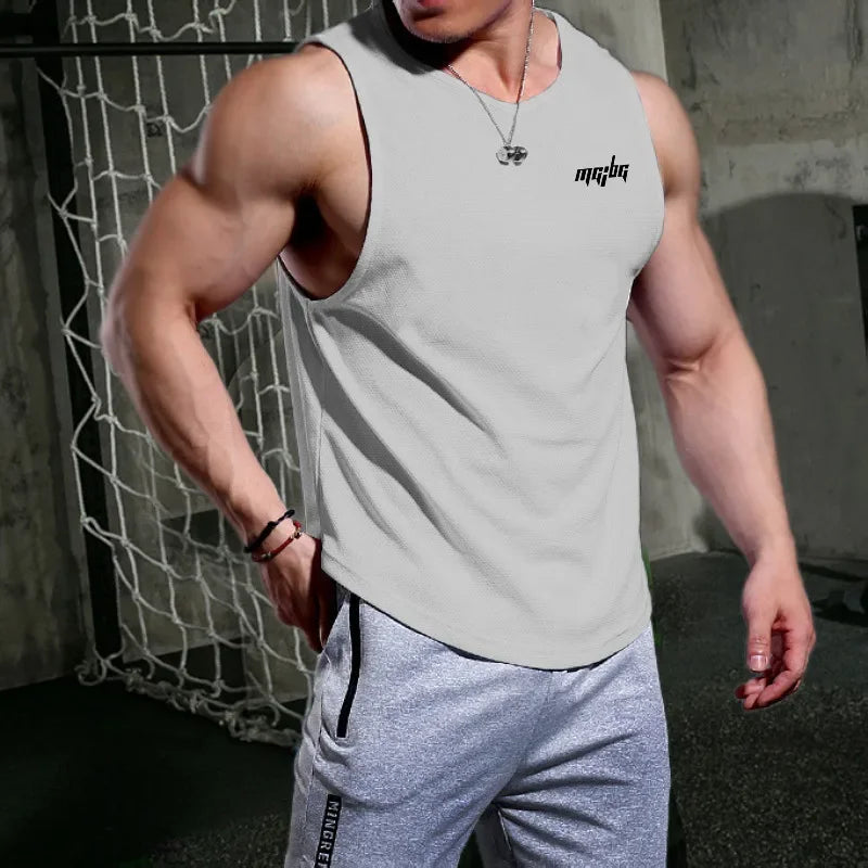 Men’s Gym Tank Top Quick-Dry Fitness Running Vest Bodybuilding Shirt worn by a muscular man in casual athletic attire.