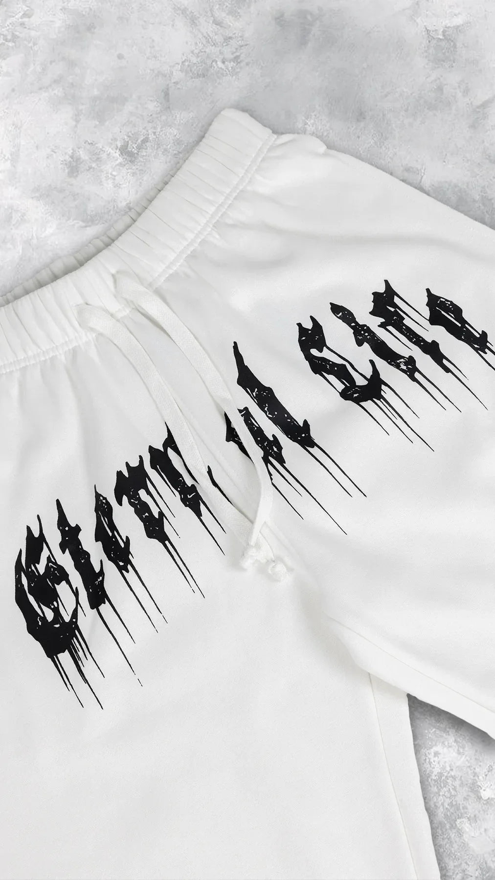 2024 Men’s Sports Pants Casual Gym Training Joggers for New Year with stylish graphic print on white fabric.