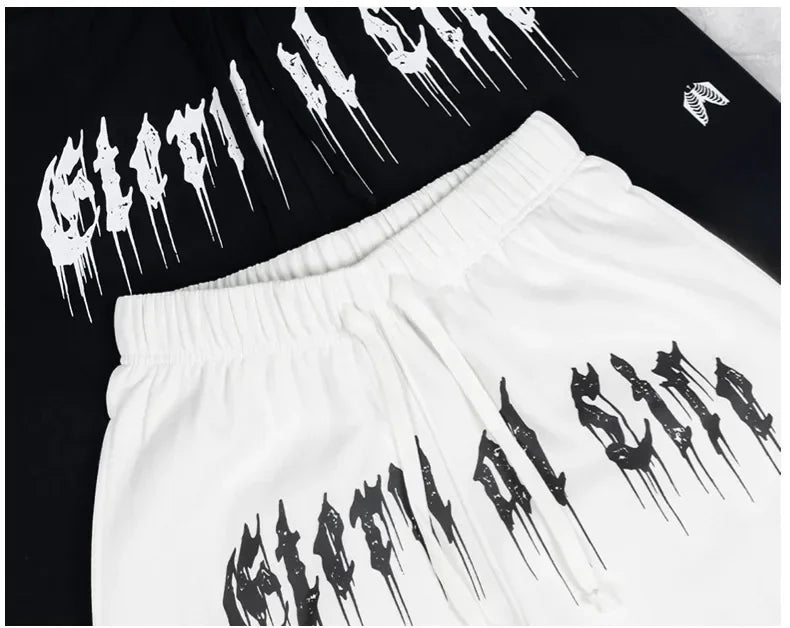 2024 Men’s Sports Pants Casual Gym Training Joggers for New Year in black and white with stylish drip lettering.