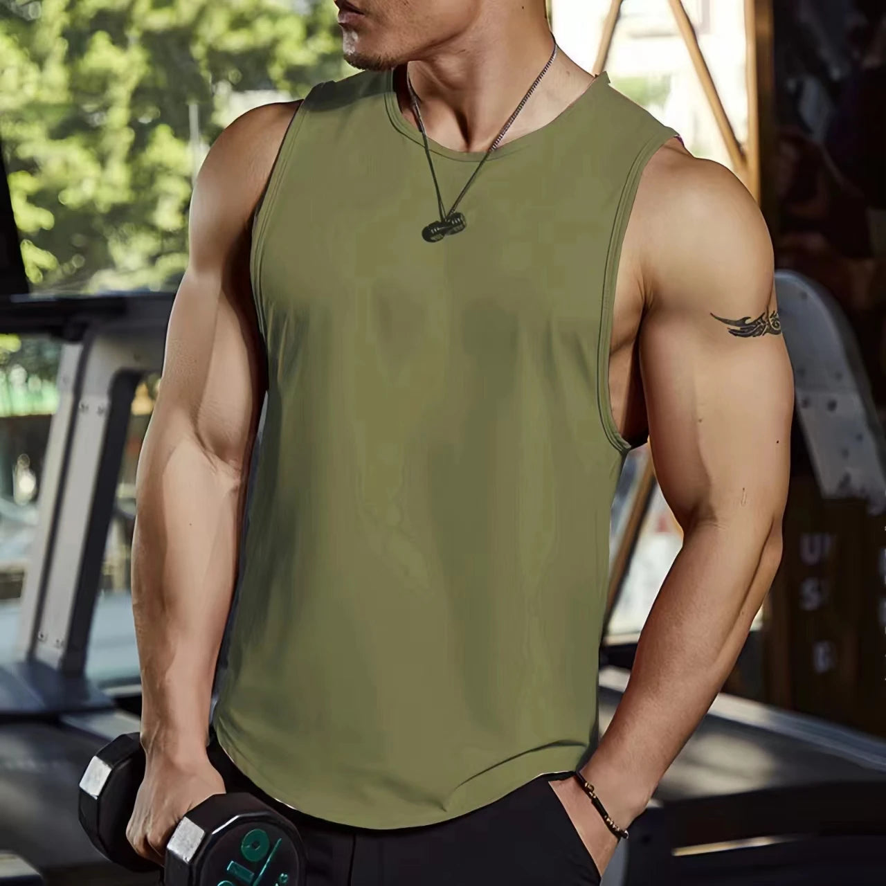 Men’s Summer Gym Cotton Tank Top Sleeveless Vest worn by a man lifting weights in a gym setting.